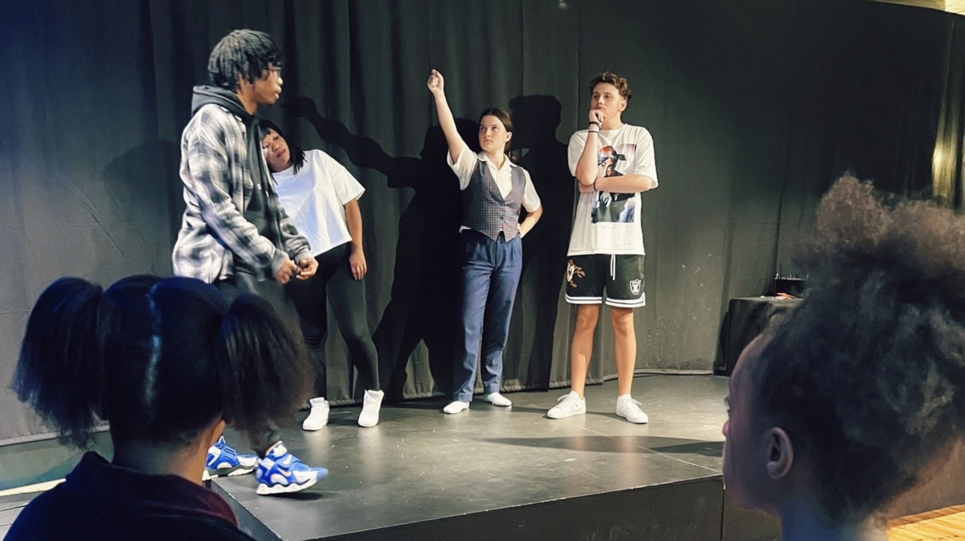 TA-DA! acting students performing a scene on stage